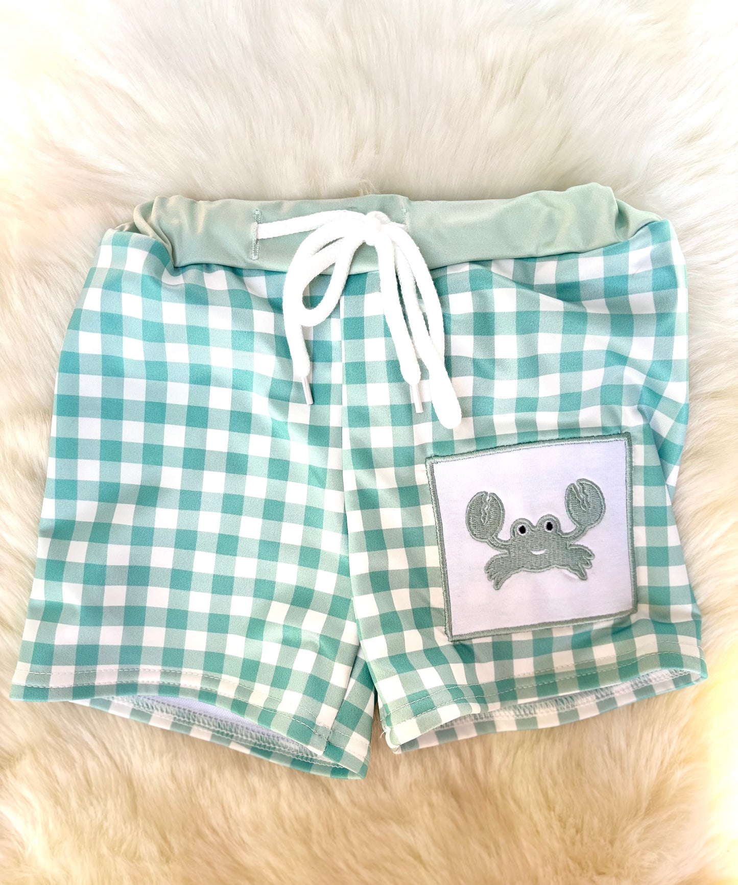 Green plaid crab embroidered swim trunks